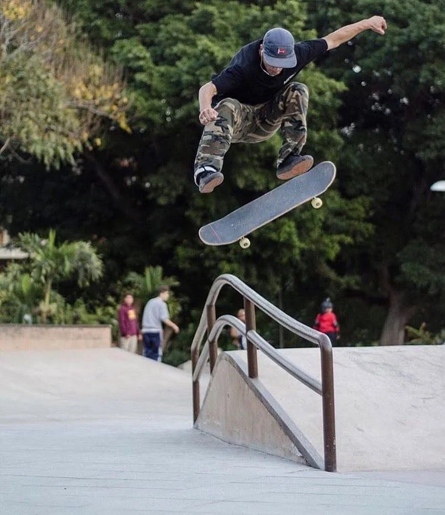 Byron skate team jumping a handrail